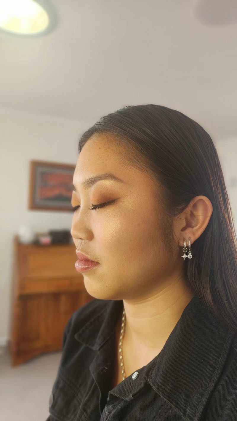 Profile portrait with soft, natural-finish makeup, one of Bonnie's own looks